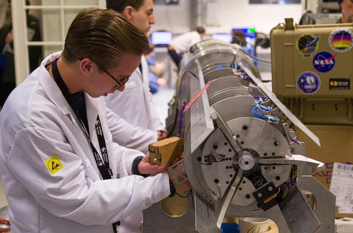 Carson Brown, a UK Pigman College of Engineering and Lewis Honors College student, makes final preparations on the payload before launch in Norway. 